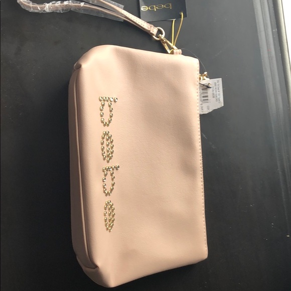 bebe Handbags - New bebe Jetta top zip wristlet blush